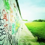 A photograph of the graffiti on the eastern side of the Berlin wall.