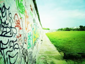 A photograph of the graffiti on the eastern side of the Berlin wall.