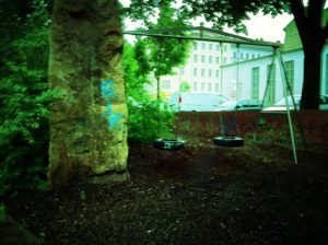 A photograph of a tire swing playground in Berlin.